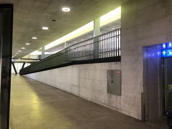 Empty subway station platform at night