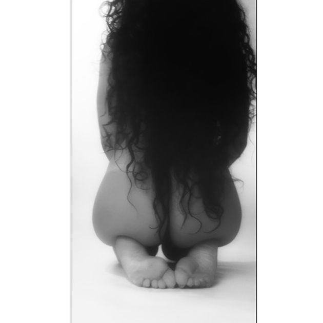 one person, indoors, real people, studio shot, hairstyle, hair, child, curly hair, women, sitting, lifestyles, full length, childhood, auto post production filter, females, shirtless, portrait, wall - building feature, human body part, human hair, innocence