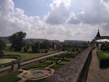 High angle view of chateau neercanne garden against cloudy sky