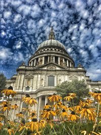 Low angle view of cathedral against cloudy sky