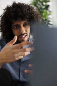 Portrait of woman using mobile phone