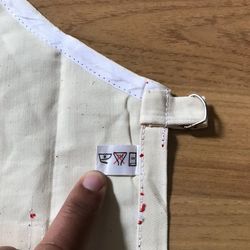 High angle view of hand holding text on table