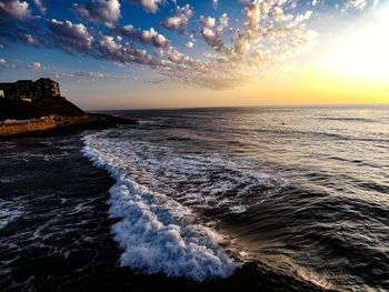 Scenic view of sea against sky during sunset