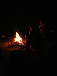 View of fire in dark room