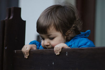 Close-up of baby girl at home