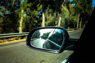 Road seen through car windshield