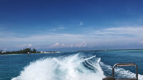 Scenic view of sea against blue sky