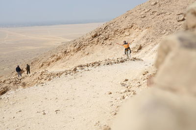 Full length of man on arid landscape