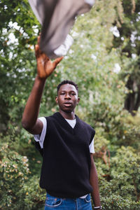 Young african man portrait. plastic pollution, ecology concept