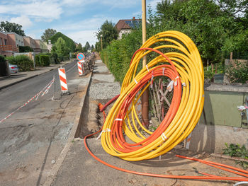 Coils of plastic casings, data cable put in underground trench. fiber optic cable for fast internet.