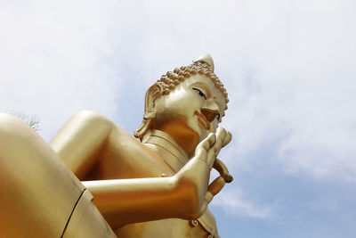 Low angle view of statue against sky