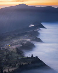 Aerial view of mountains during sunset