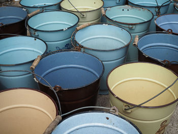 High angle view of metal buckets for sale in flea market