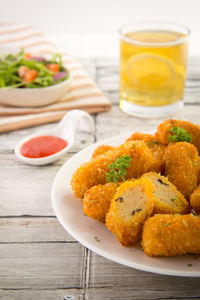 Crispy chicken nugget served with tomato ketchup