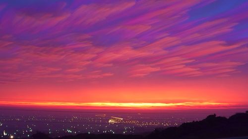 Illuminated cityscape at night