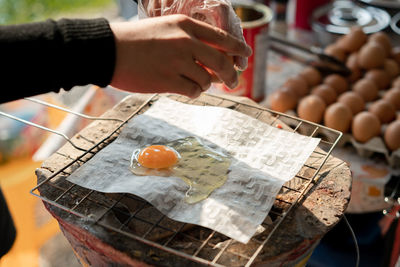 High angle view of man preparing food