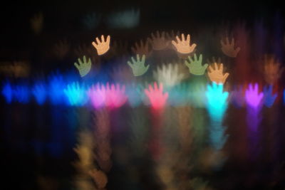 Close-up of illuminated lights at night