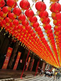 Red lanterns hanging against sky