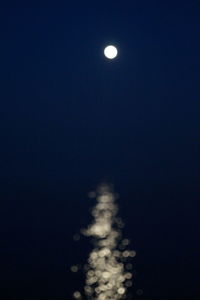 Scenic view of moon against sky at night