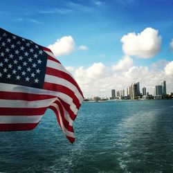 American flag against blue sky