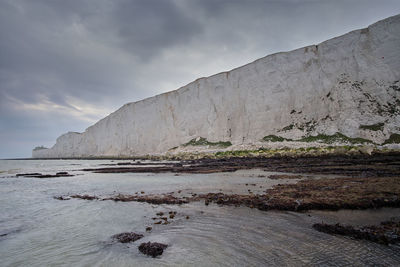 Seven sisters chalk cliffs at low tide near eastbourne, east sussex, united kingdom