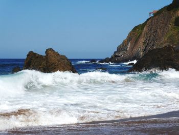 Scenic view of sea against clear sky