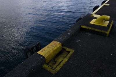 High angle view of yellow boat in sea