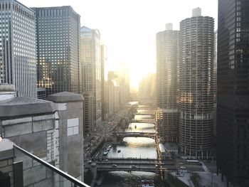 Modern buildings in city against clear sky