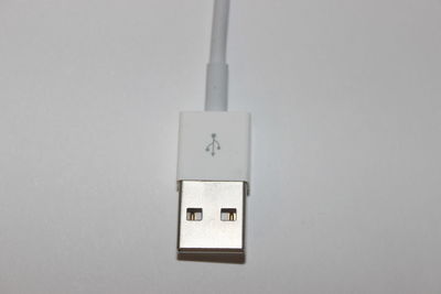 Close-up of electric lamp on wall