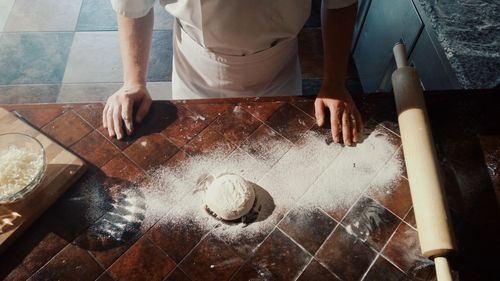 High angle view of man preparing food