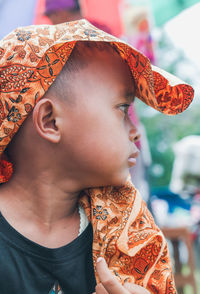 Close-up of woman wearing hat