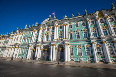 Low angle view of building against blue sky