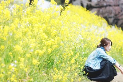 Woman sitting on grass