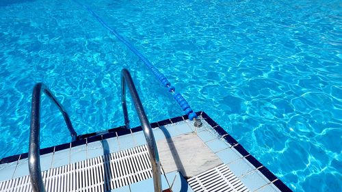 High angle view of ladder in swimming pool