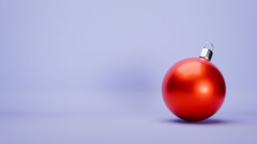 Close-up of christmas tree against blue background