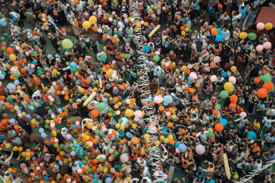 High angle view of group of people in street