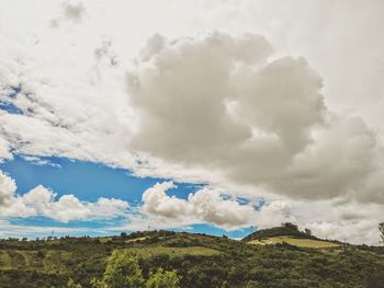 Low angle view of land against sky