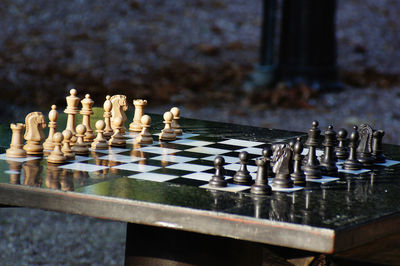 Close-up of arranged chess board on table