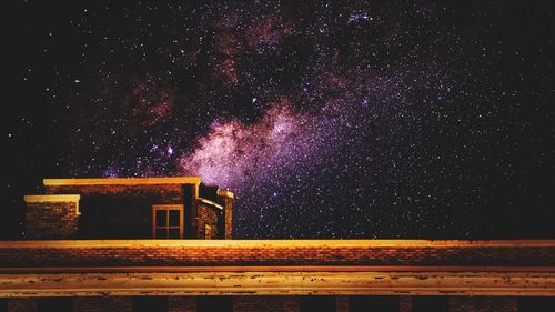 Low angle view of firework against sky at night