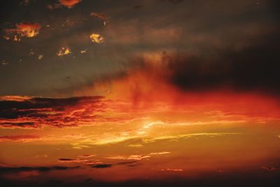 Low angle view of dramatic sky during sunset