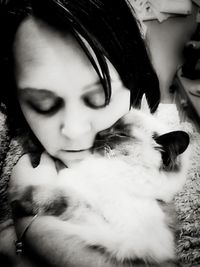 Portrait of woman with cat