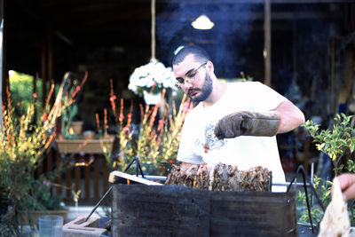 Man holding flowers