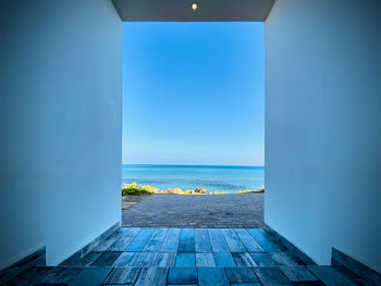 View of swimming pool against clear blue sky