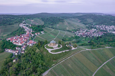 High angle view of vineyard against sky