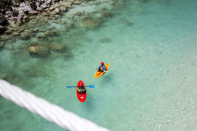 High angle view of people in sea