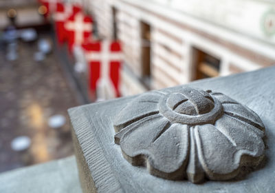 Close-up of stone rosette.