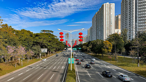 High angle view of city street against sky