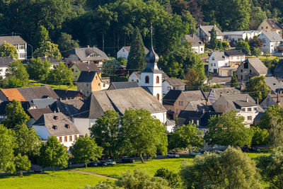 Scenic view at the church of village brauneberg on river moselle