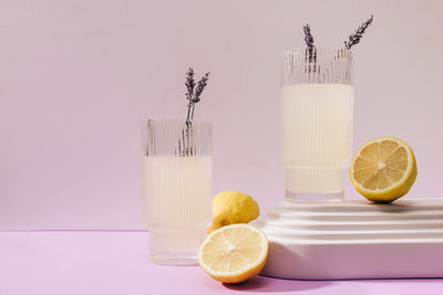 High angle view of fruits in glass against white background