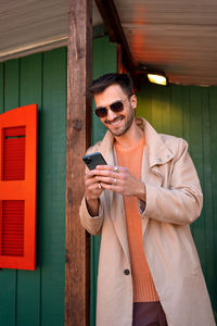 Young man using mobile phone